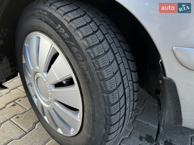 Сірий Міцубісі Lancer, об'ємом двигуна 1.58 л та пробігом 333 тис. км за 2700 $, фото 17 на Automoto.ua