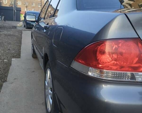 Сірий Міцубісі Lancer, об'ємом двигуна 1.58 л та пробігом 217 тис. км за 3500 $, фото 9 на Automoto.ua