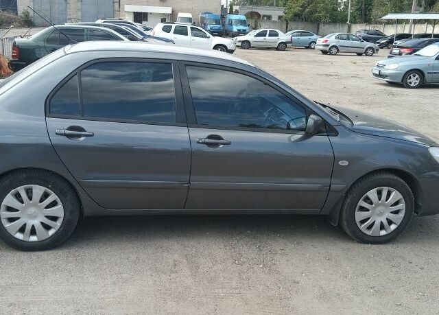 Сірий Міцубісі Lancer, об'ємом двигуна 0 л та пробігом 273 тис. км за 4800 $, фото 1 на Automoto.ua