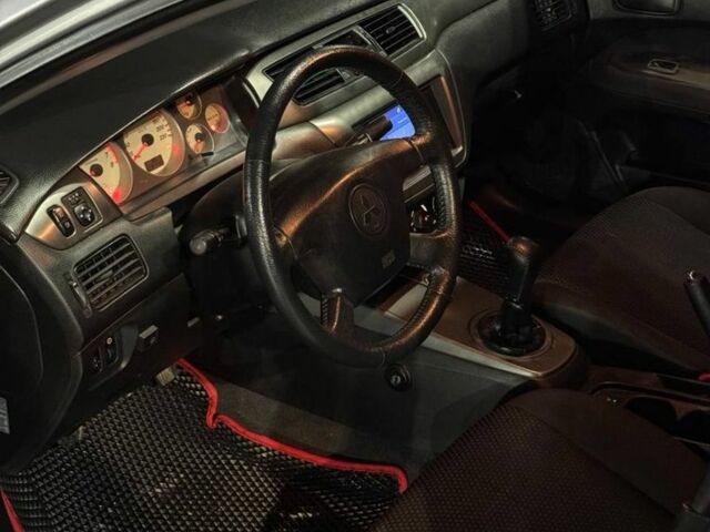 Серый Мицубиси Лансер, объемом двигателя 1.6 л и пробегом 330 тыс. км за 3200 $, фото 6 на Automoto.ua