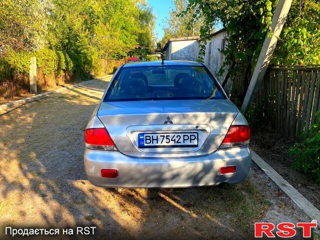 Сірий Міцубісі Lancer, об'ємом двигуна 1.6 л та пробігом 36 тис. км за 3500 $, фото 5 на Automoto.ua