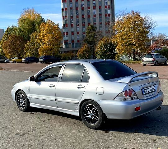 Сірий Міцубісі Lancer, об'ємом двигуна 1.6 л та пробігом 307 тис. км за 4599 $, фото 4 на Automoto.ua