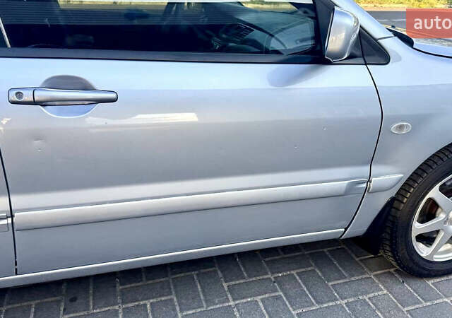 Сірий Міцубісі Lancer, об'ємом двигуна 1.6 л та пробігом 263 тис. км за 4900 $, фото 22 на Automoto.ua