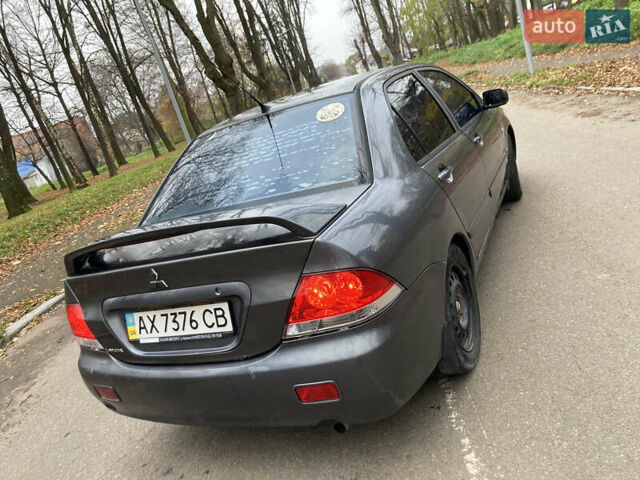 Сірий Міцубісі Lancer, об'ємом двигуна 1.6 л та пробігом 222 тис. км за 4900 $, фото 3 на Automoto.ua