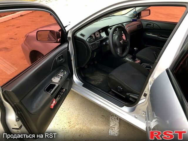 Серый Мицубиси Лансер, объемом двигателя 1.6 л и пробегом 0 тыс. км за 4000 $, фото 5 на Automoto.ua