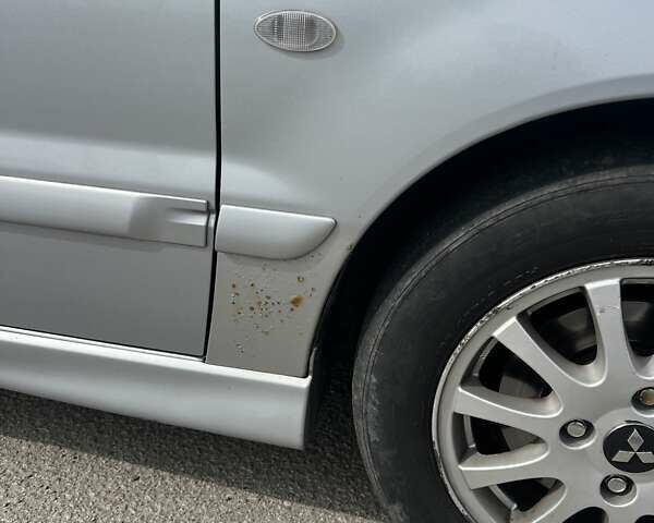 Сірий Міцубісі Lancer, об'ємом двигуна 1.58 л та пробігом 197 тис. км за 3450 $, фото 6 на Automoto.ua