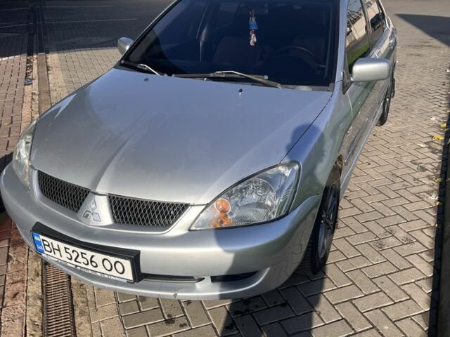 Серый Мицубиси Лансер, объемом двигателя 1.6 л и пробегом 524 тыс. км за 3800 $, фото 1 на Automoto.ua