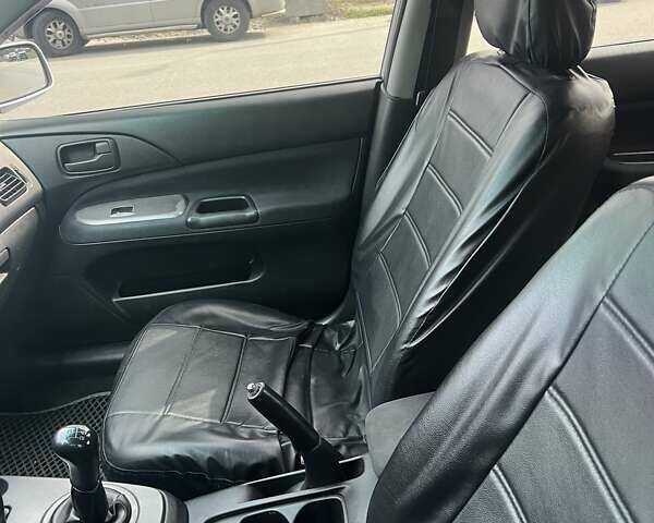 Сірий Міцубісі Lancer, об'ємом двигуна 1.58 л та пробігом 197 тис. км за 3450 $, фото 2 на Automoto.ua