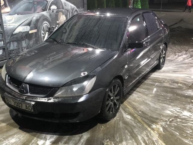 Міцубісі Lancer 2006 у Синельниковом на Automoto.ua Сірий Міцубісі Lancer, об'ємом двигуна 2 л та пробігом 200 тис. км за 3000 $, фото 6 на Automoto.ua