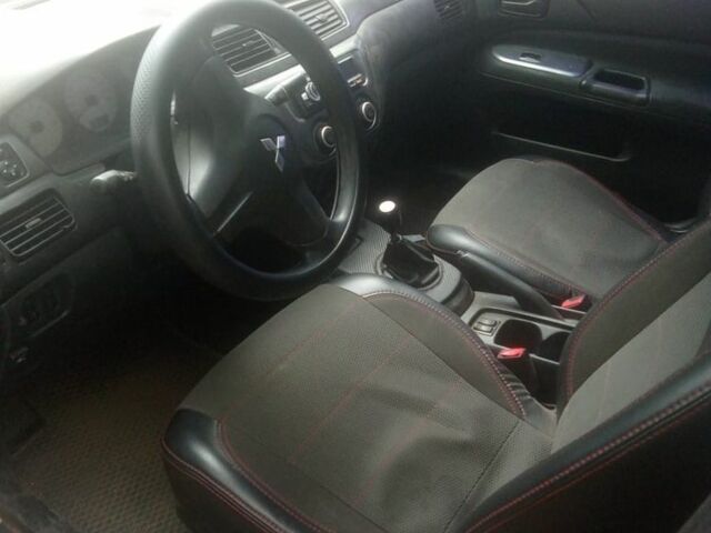 Сірий Міцубісі Lancer, об'ємом двигуна 1.6 л та пробігом 3 тис. км за 3200 $, фото 2 на Automoto.ua