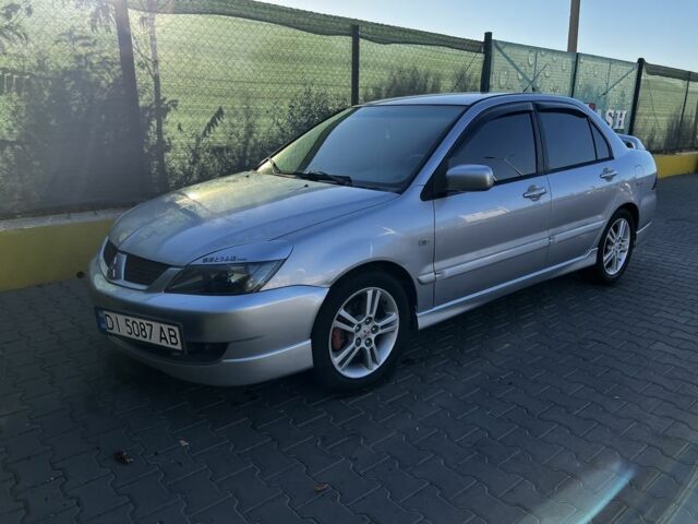 Сірий Міцубісі Lancer, об'ємом двигуна 2 л та пробігом 192 тис. км за 5400 $, фото 1 на Automoto.ua