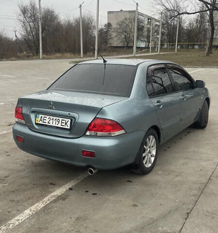 Сірий Міцубісі Lancer, об'ємом двигуна 1.58 л та пробігом 267 тис. км за 5300 $, фото 2 на Automoto.ua