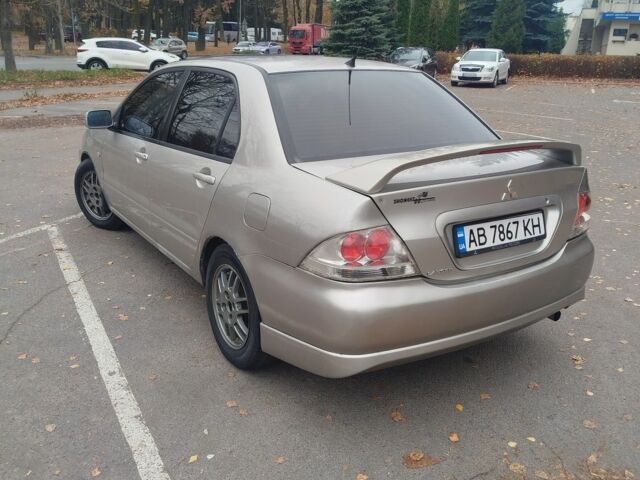Сірий Міцубісі Lancer, об'ємом двигуна 2 л та пробігом 330 тис. км за 3450 $, фото 5 на Automoto.ua