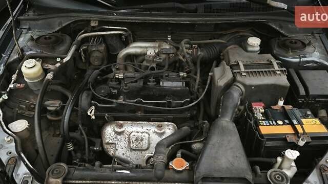 Серый Мицубиси Лансер, объемом двигателя 1.6 л и пробегом 263 тыс. км за 3650 $, фото 15 на Automoto.ua