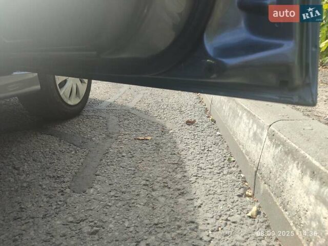 Сірий Міцубісі Lancer, об'ємом двигуна 1.6 л та пробігом 242 тис. км за 4900 $, фото 18 на Automoto.ua