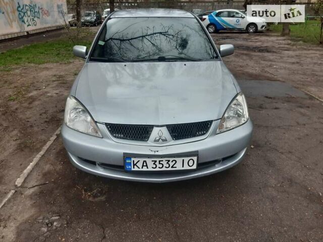 Сірий Міцубісі Lancer, об'ємом двигуна 1.58 л та пробігом 340 тис. км за 4000 $, фото 1 на Automoto.ua