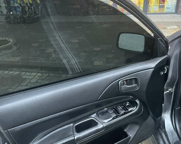 Сірий Міцубісі Lancer, об'ємом двигуна 1.6 л та пробігом 244 тис. км за 2999 $, фото 8 на Automoto.ua