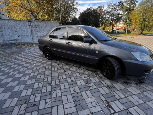 Сірий Міцубісі Lancer, об'ємом двигуна 0 л та пробігом 279 тис. км за 3700 $, фото 16 на Automoto.ua