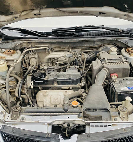 Серый Мицубиси Лансер, объемом двигателя 1.6 л и пробегом 253 тыс. км за 2850 $, фото 18 на Automoto.ua