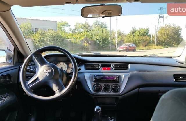 Сірий Міцубісі Lancer, об'ємом двигуна 1.6 л та пробігом 229 тис. км за 4900 $, фото 11 на Automoto.ua