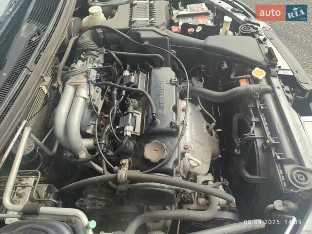 Сірий Міцубісі Lancer, об'ємом двигуна 1.6 л та пробігом 242 тис. км за 4900 $, фото 38 на Automoto.ua
