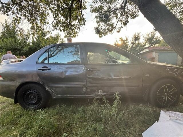 Сірий Міцубісі Lancer, об'ємом двигуна 0 л та пробігом 3 тис. км за 1800 $, фото 3 на Automoto.ua