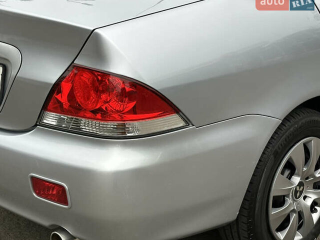 Серый Мицубиси Лансер, объемом двигателя 1.58 л и пробегом 183 тыс. км за 4800 $, фото 12 на Automoto.ua