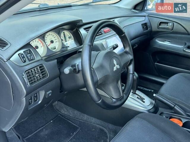 Серый Мицубиси Лансер, объемом двигателя 0 л и пробегом 182 тыс. км за 6500 $, фото 12 на Automoto.ua