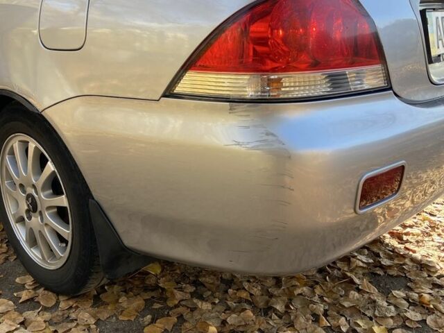 Серый Мицубиси Лансер, объемом двигателя 1.6 л и пробегом 204 тыс. км за 3999 $, фото 10 на Automoto.ua