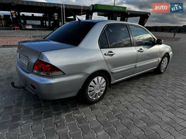 Сірий Міцубісі Lancer, об'ємом двигуна 1.58 л та пробігом 333 тис. км за 2700 $, фото 3 на Automoto.ua