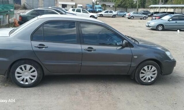 Серый Мицубиси Лансер, объемом двигателя 0 л и пробегом 273 тыс. км за 4600 $, фото 4 на Automoto.ua