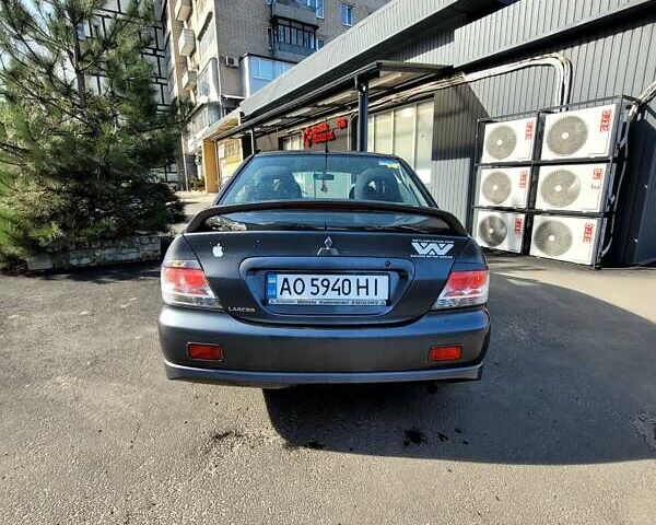 Сірий Міцубісі Lancer, об'ємом двигуна 2 л та пробігом 255 тис. км за 4800 $, фото 3 на Automoto.ua