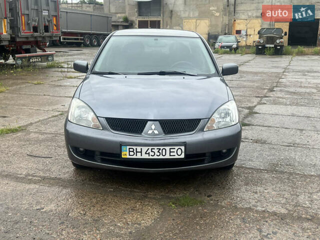 Серый Мицубиси Лансер, объемом двигателя 1.6 л и пробегом 193 тыс. км за 4700 $, фото 2 на Automoto.ua