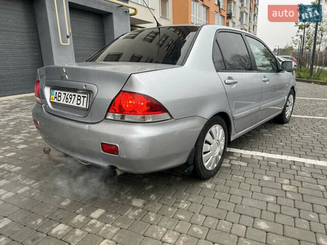 Сірий Міцубісі Lancer, об'ємом двигуна 1.58 л та пробігом 333 тис. км за 2450 $, фото 4 на Automoto.ua