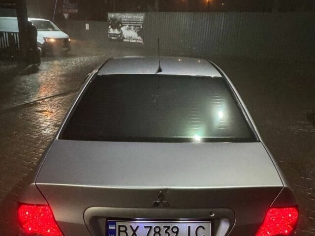 Серый Мицубиси Лансер, объемом двигателя 1.6 л и пробегом 330 тыс. км за 3200 $, фото 5 на Automoto.ua