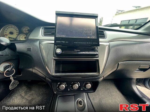 Сірий Міцубісі Lancer, об'ємом двигуна 1.6 л та пробігом 162 тис. км за 4650 $, фото 8 на Automoto.ua