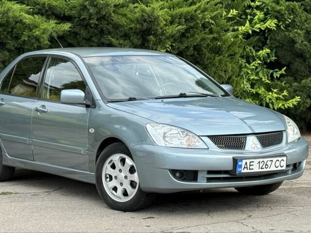 Серый Мицубиси Лансер, объемом двигателя 1.6 л и пробегом 220 тыс. км за 4400 $, фото 8 на Automoto.ua