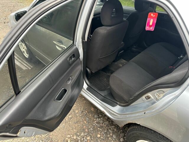 Сірий Міцубісі Lancer, об'ємом двигуна 1.6 л та пробігом 270 тис. км за 2900 $, фото 10 на Automoto.ua