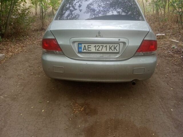 Сірий Міцубісі Lancer, об'ємом двигуна 1.6 л та пробігом 3 тис. км за 3200 $, фото 5 на Automoto.ua