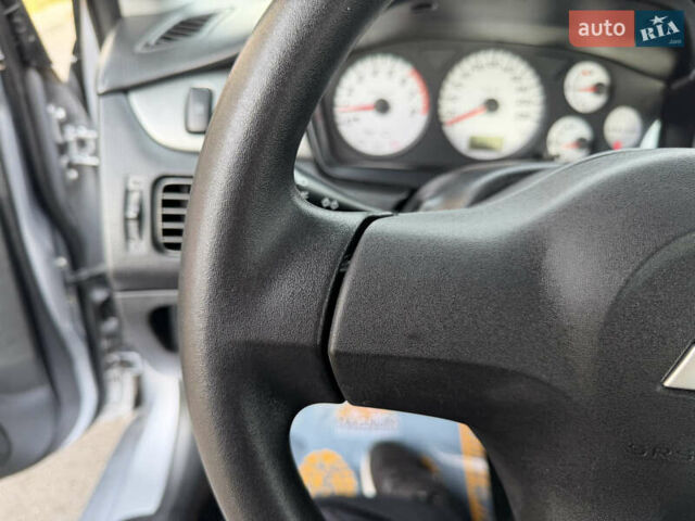 Серый Мицубиси Лансер, объемом двигателя 1.3 л и пробегом 160 тыс. км за 5555 $, фото 45 на Automoto.ua