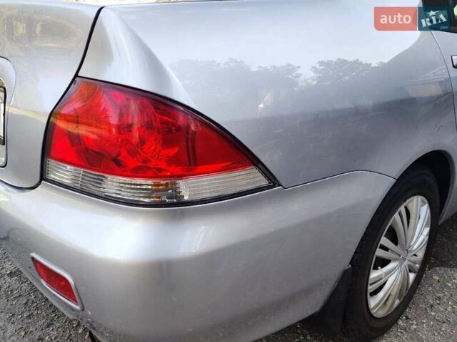Сірий Міцубісі Lancer, об'ємом двигуна 1.58 л та пробігом 122 тис. км за 6300 $, фото 16 на Automoto.ua