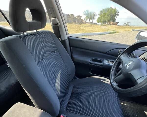 Сірий Міцубісі Lancer, об'ємом двигуна 1.6 л та пробігом 283 тис. км за 4900 $, фото 11 на Automoto.ua