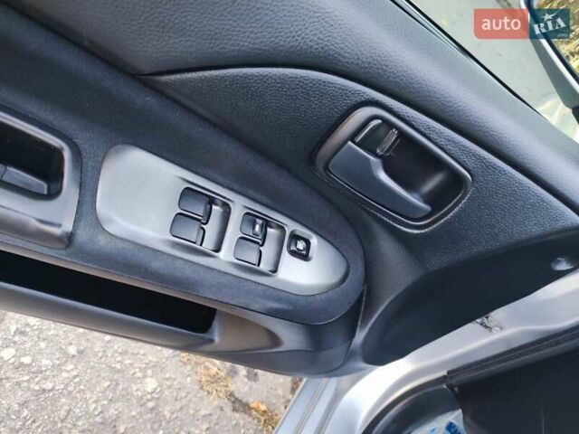 Сірий Міцубісі Lancer, об'ємом двигуна 1.58 л та пробігом 122 тис. км за 6300 $, фото 43 на Automoto.ua