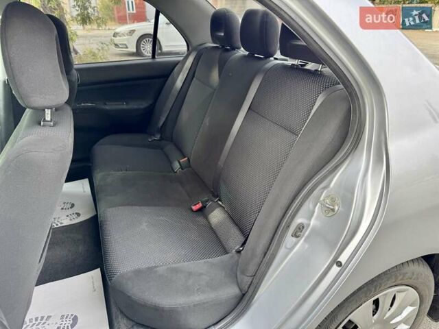 Сірий Міцубісі Lancer, об'ємом двигуна 1.58 л та пробігом 138 тис. км за 4990 $, фото 17 на Automoto.ua