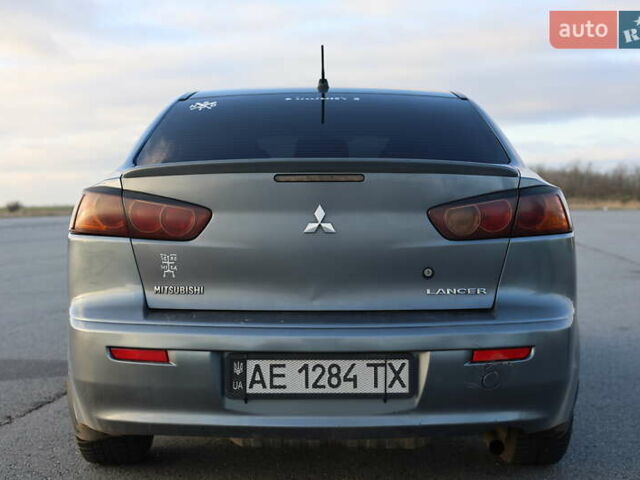 Серый Мицубиси Лансер, объемом двигателя 1.5 л и пробегом 330 тыс. км за 5250 $, фото 5 на Automoto.ua