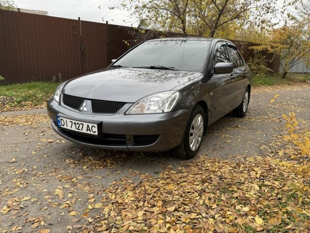 Сірий Міцубісі Lancer, об'ємом двигуна 1.6 л та пробігом 247 тис. км за 4900 $, фото 4 на Automoto.ua