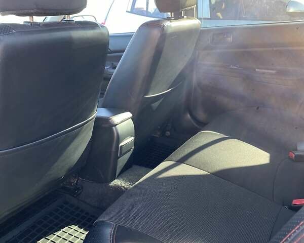 Сірий Міцубісі Lancer, об'ємом двигуна 1.6 л та пробігом 293 тис. км за 5000 $, фото 19 на Automoto.ua