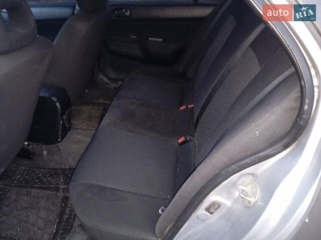 Мицубиси Лансер 2007 в Ивано-Франковске на Automoto.ua Серый Мицубиси Лансер, объемом двигателя 1.58 л и пробегом 238 тыс. км за 2950 $, фото 3 на Automoto.ua