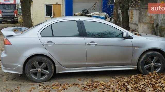 Серый Мицубиси Лансер, объемом двигателя 2 л и пробегом 305 тыс. км за 6300 $, фото 4 на Automoto.ua