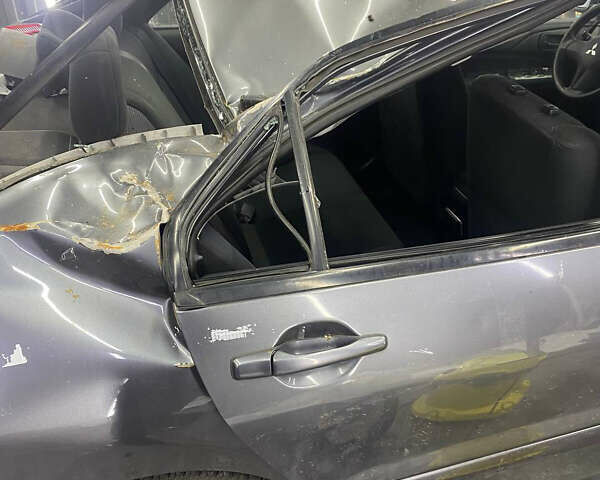 Серый Мицубиси Лансер, объемом двигателя 1.6 л и пробегом 100 тыс. км за 2500 $, фото 1 на Automoto.ua